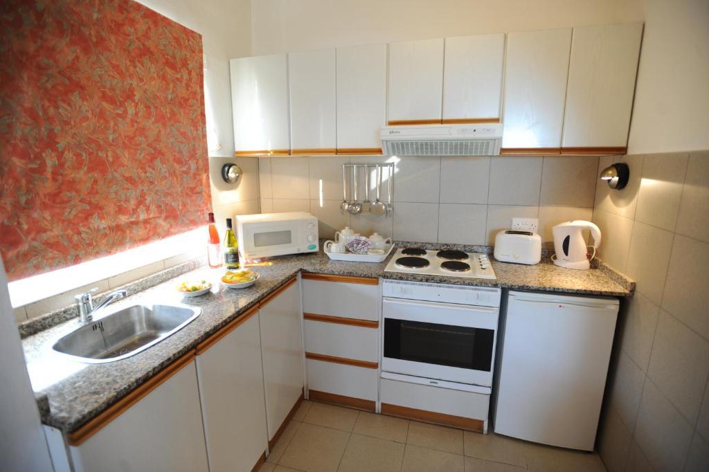 Club Salina Wharf Aparthotel Qawra Quarto foto